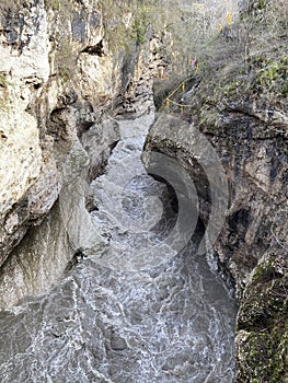 Beautiful landscape of mountain river in amazing and mysterious nature. Mountain waterway flowing through mountainous