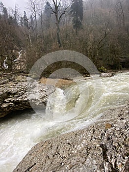 Beautiful landscape of mountain river in amazing and mysterious nature. Mountain waterway flowing through mountainous