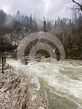 Beautiful landscape of mountain river in amazing and mysterious nature. Mountain waterway flowing through mountainous