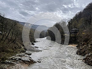 Beautiful landscape of mountain river in amazing and mysterious nature. Mountain waterway flowing through mountainous