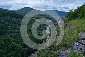 Beautiful landscape in a mountain valley. Summer green foliage o photo