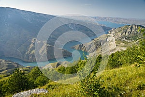 Beautiful landscape with mountains and a river on a sunny summer day with clouds. Sulak Canyon. Dagestan