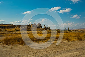 Beautiful landscape of mountains and rocks in the form of mushrooms. Fairy chimneys. Cappadocia, Turkey