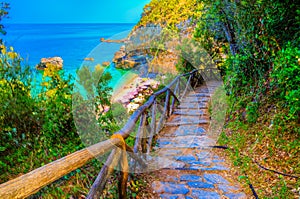 Stairs to the beach in summer holiday of Greece photo