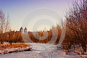 Beautiful landscape of nature and ancient chirch on the background. Winter season photo