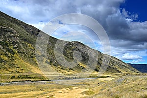 Beautiful landscape in New Zealand with yellow grassland and mountains. Molesworth station, South Island