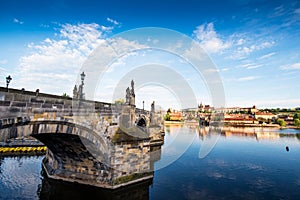 The beautiful landscape of the old town and the Hradcany Prague Castle with St. Vitus Cathedral and St. George church and