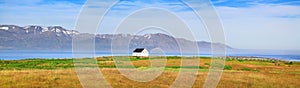 Beautiful landscape panorama with old house in Iceland