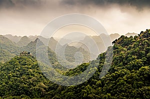 Beautiful landscape with peak mountains and green forest on near Ha Long Bay. Ngu Lam Peak on Cat Ba Island, Vietnam