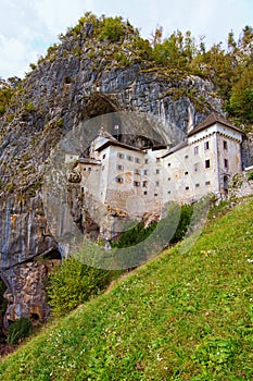 Beautiful landscape photo of Predjama castle Predjamski grad. Renaissance castle built within a cave mouth.