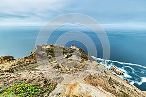 Beautiful landscape, Point Reyes lighthouse on the rocky coast of the Pacific Ocean, a long staircase leads to it