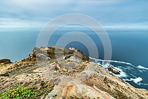 Beautiful landscape, Point Reyes lighthouse on the rocky coast of the Pacific Ocean, a long staircase leads to it