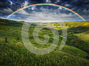 Beautiful landscape with a rainbow in the sky