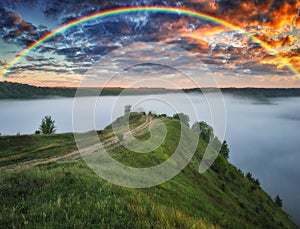 Beautiful landscape with a rainbow in the sky