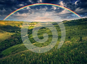 Beautiful landscape with a rainbow in the sky