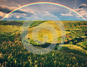 Beautiful landscape with a rainbow in the sky