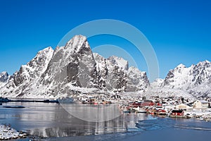 Beautiful landscape from Reine fishing village with blue sky in winter season, Lofoten islands, Norway