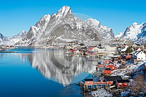 Beautiful landscape of Reine fishing village with reflection in winter season, Lofoten island in Nordland, Norway, Scandinavia