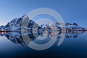 Beautiful landscape from Reine fishing village at twilight in winter season, Lofoten islands, Norway