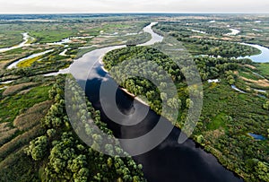 beautiful landscape with river and green vegetation on shores, polesie,