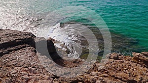 Beautiful landscape of rock formations on the La Pineda beach in Salou Spain.