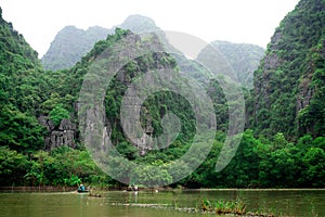 Beautiful landscape with rocks and rice fields in Ninh Binh and Tam Coc in Vietnam.