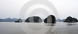 Beautiful landscape with rocky islands at Halong bay, Vietnam. Calm water, no people