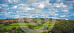 Beautiful landscape with rural houses, fields and trees in South Wales