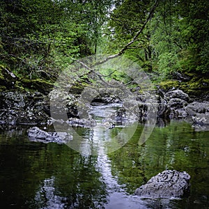 Beautiful landscape of Scotland ,UK.Stream with rocks in forest