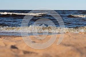 Beautiful landscape of sea waves on the shores of a sandy beach. Wallpaper design