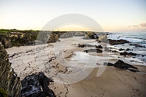 Beautiful landscape and seascape with rock formation in Samoqueira Beach, Alentejo, Portugal photo