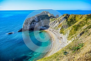 View of Durdle Door, a natural limestone arch on the Jurassic Coast near Lulworth in Dorset, England, UK