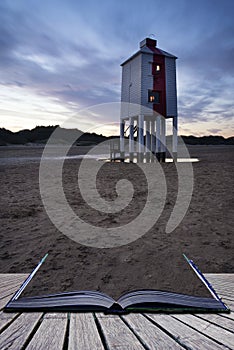 Beautiful landscape sunrise stilt lighthouse on beach conceptual