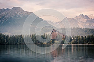 Beautiful landscape, sunset with mountains and water, lake Strbske pleso, High Tatras, Slovakia