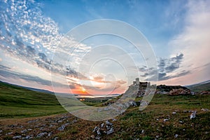 Beautiful landscape and a sunset sky over Enisala old stronghold citadel