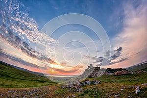 Beautiful landscape and a sunset sky over Enisala old stronghold citadel