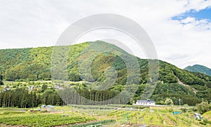 Beautiful landscape of Takayama mura at sunny summer or spring day and blue sky in Kamitakai District in northeast Nagano