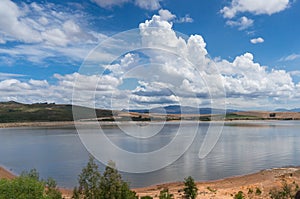 Beautiful landscape of Theewaterskloof dam with mountains on the background