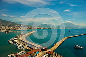 Beautiful landscape top view of the city: the blue sea, lighthouse and port. Alanya, Antalya district, Turkey, Asia