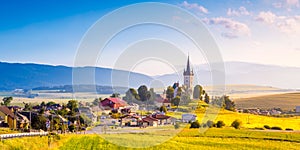 Beautiful landscape of valley in Slovakia mountains, small houses in village, rural scene. Spissky Stvrtok, Slovakia