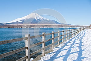 Beautiful landscape view of Fuji mountain or Mt.Fuji covered with white snow in winter seasonal at Kawaguchiko Lake.