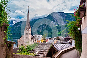 Beautiful landscape view of the Hallstatt from lake Hallstater See, Austria cloudy sky