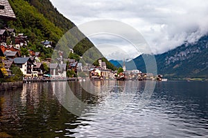 Beautiful landscape view of the Hallstatt from lake Hallstater See, Austria cloudy sky