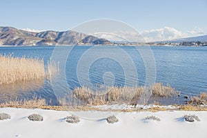 Beautiful landscape view of Kawaguchiko Lake with white snow in winter seasonal at Yamanashi.