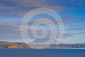 Beautiful landscape view of Lake Toya, Hokkaido, Japan. Presenting Mt. Yotei behind the cloud.