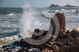 Beautiful landscape with view of ocean, perfect beach, big stones, trees, azure water. Background image. Concept travel