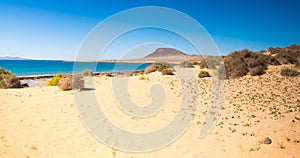 Beautiful landscape view of the path from Caleta del Sebo to Montana Amarilla, volcano of La Graciosa Island