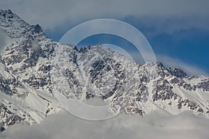 Beautiful landscape view of the snowy mountain spine