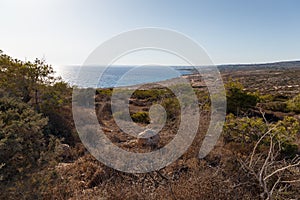 Beautiful landscape with views of the blue sea and mountains. Travel concept. Seascape on the background of the wild rocky coast