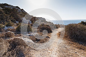 Beautiful landscape with views of the blue sea and mountains. Travel concept. Seascape on the background of the wild rocky coast